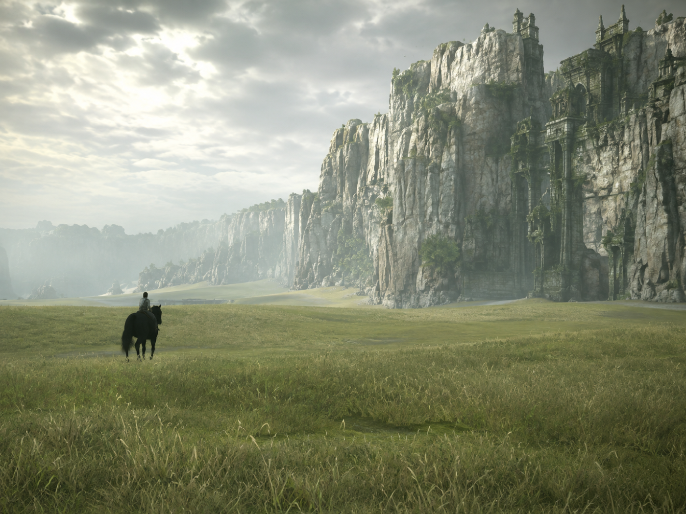 Shadow of the Colossus › A lonely grassland beneath monumental cliffs and open sky